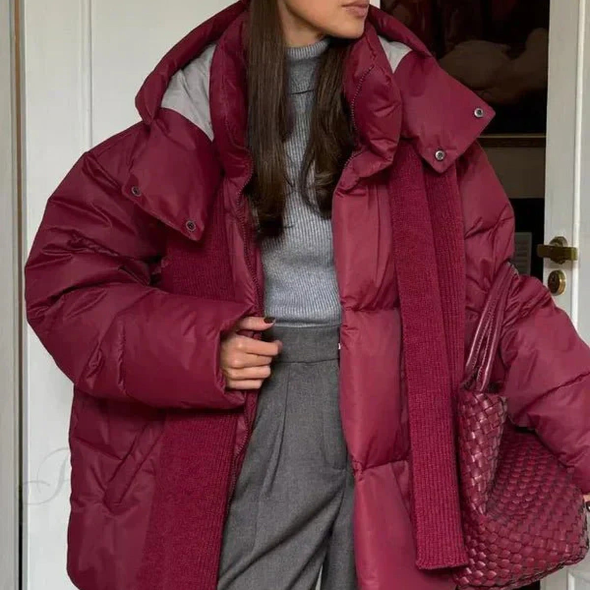 Women's hooded quilted puffer winter coat with long sleeves and zip front