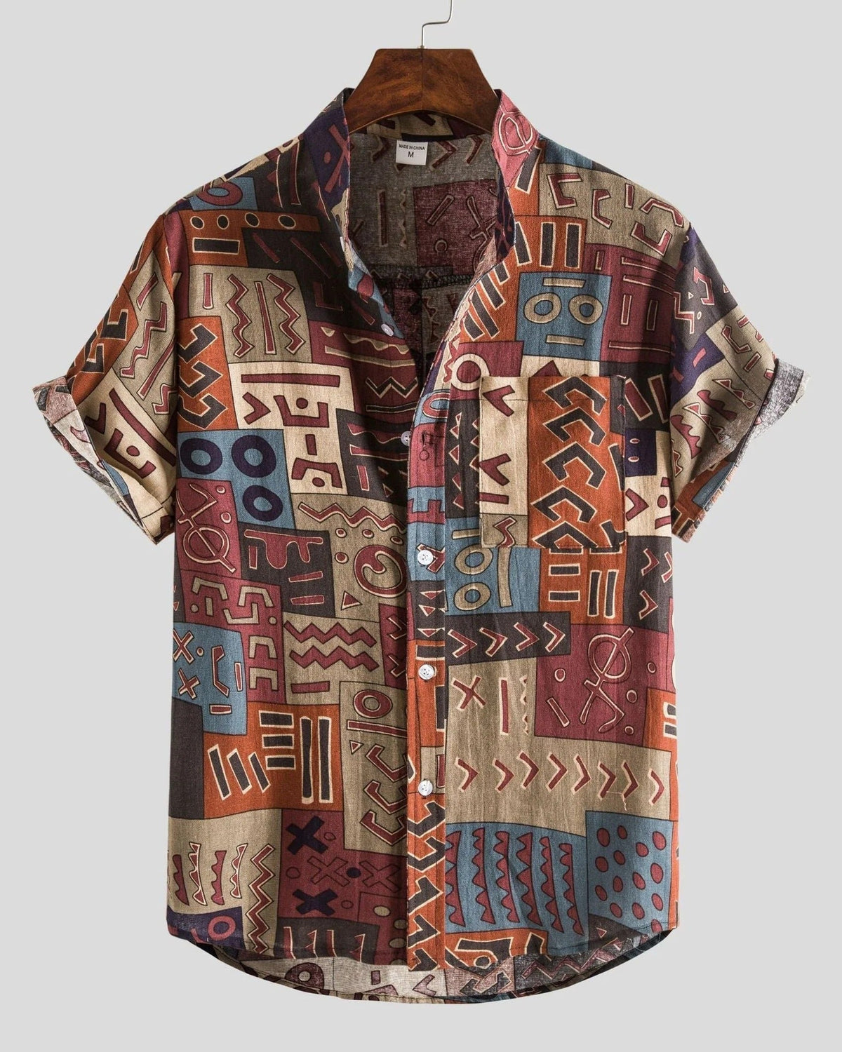 Men's short sleeve button shirt with geometric and leaf patterns