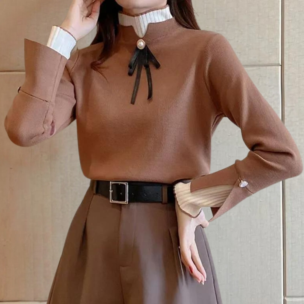 Women's fitted jumper with high ribbed neck, long sleeves and bow detail