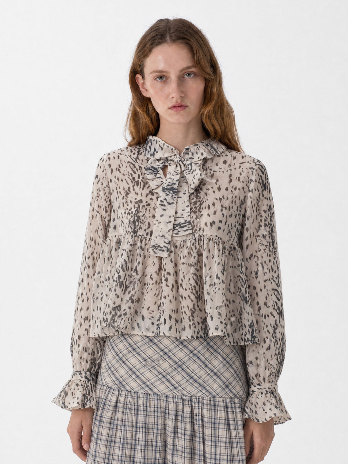 Women's beige animal print blouse with frill collar and long sleeves