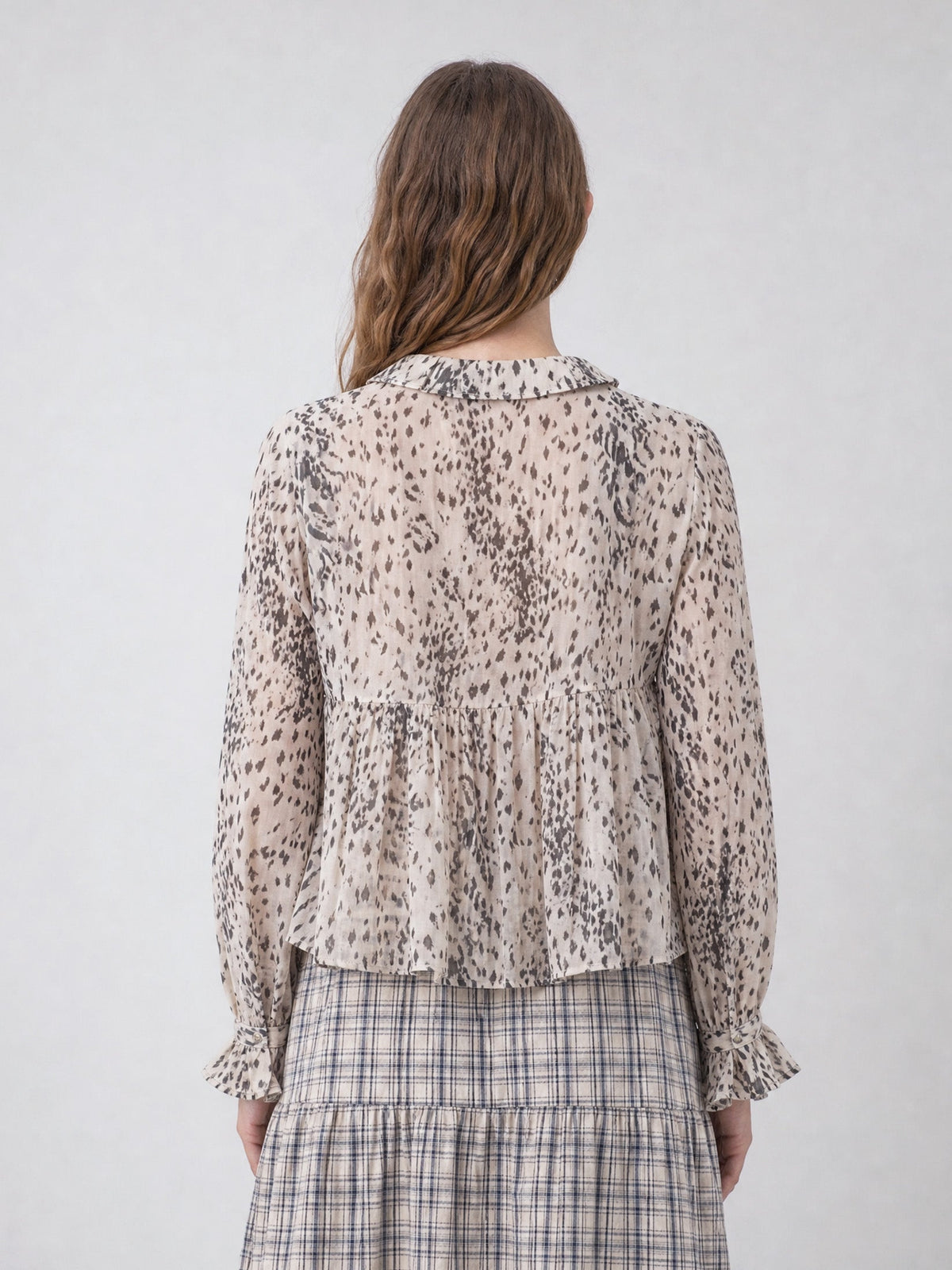 Women's beige animal print blouse with frill collar and long sleeves