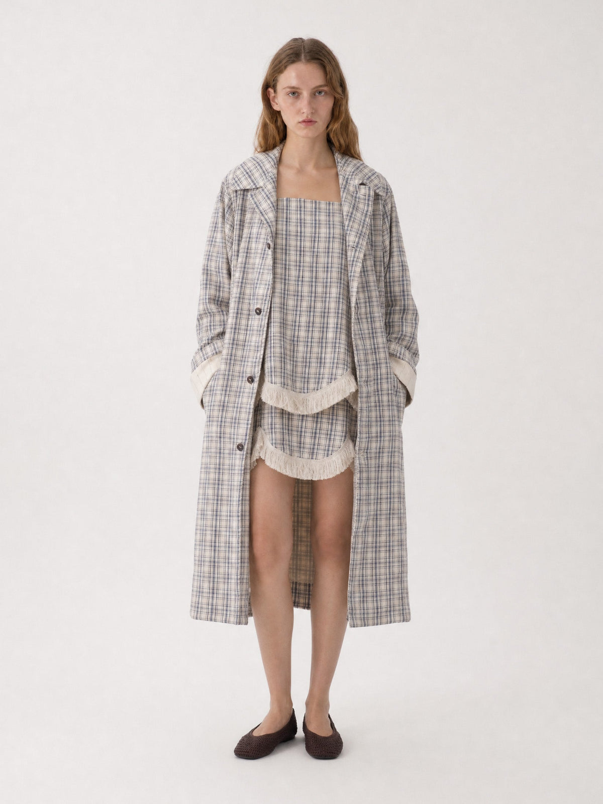 Women's beige checked long trench coat with notched collar and button front