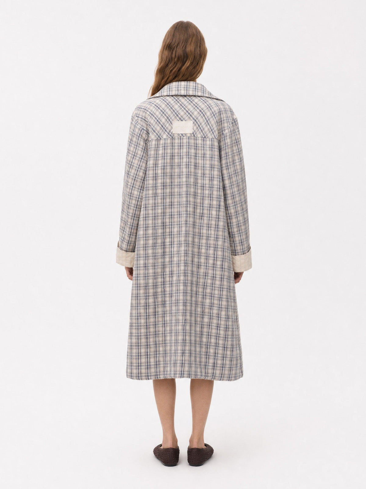 Women's beige checked long trench coat with notched collar and button front