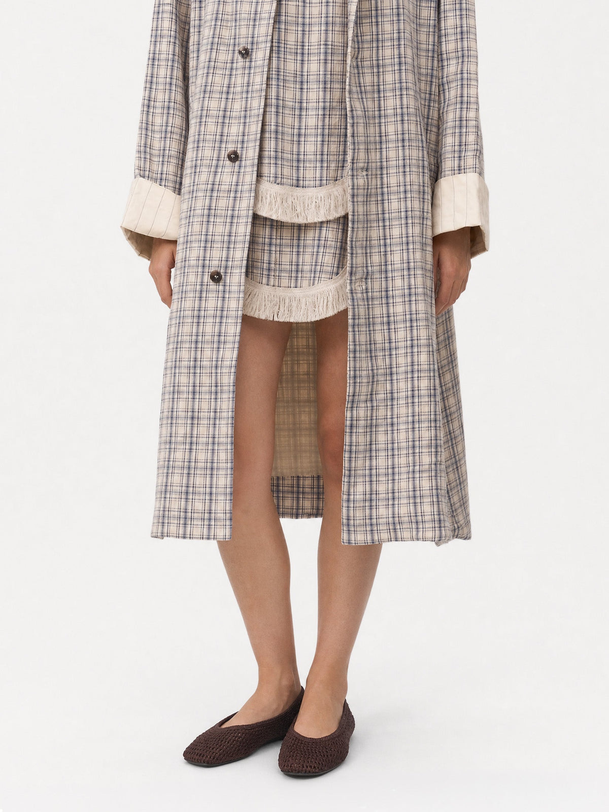Women's beige checked long trench coat with notched collar and button front