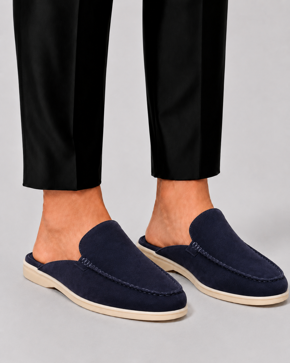 Men's open-back loafer mules with moc toes and stitched trims