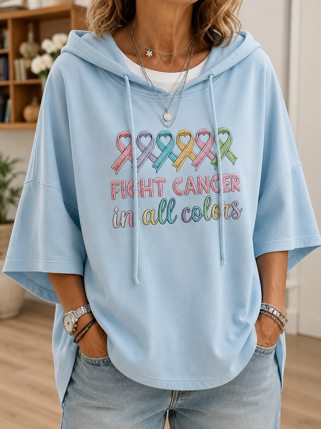 Women's hooded short-sleeve hoodie with colourful awareness ribbons and cancer awareness text
