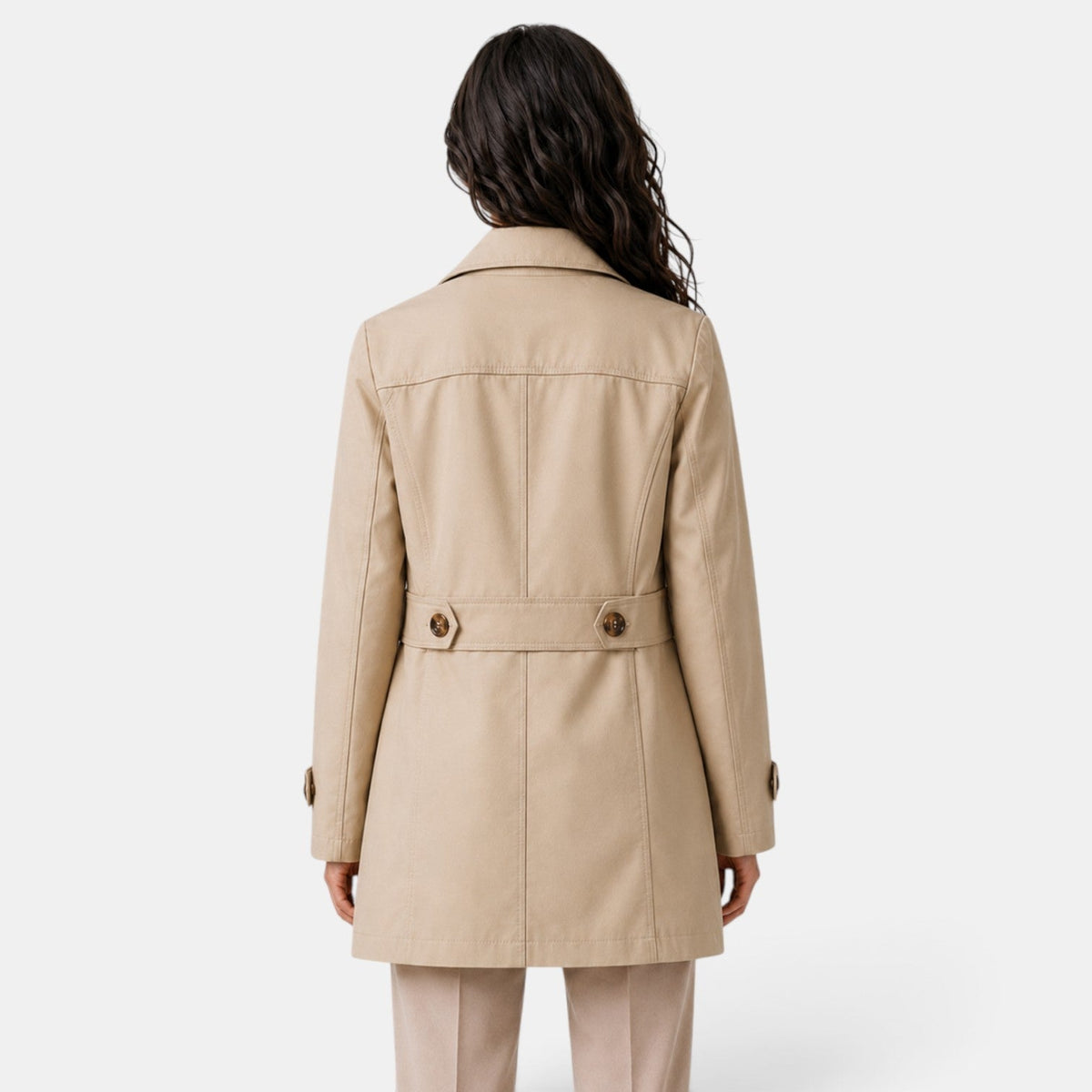 Women's long button-front trench coat with notched lapels and flap pockets