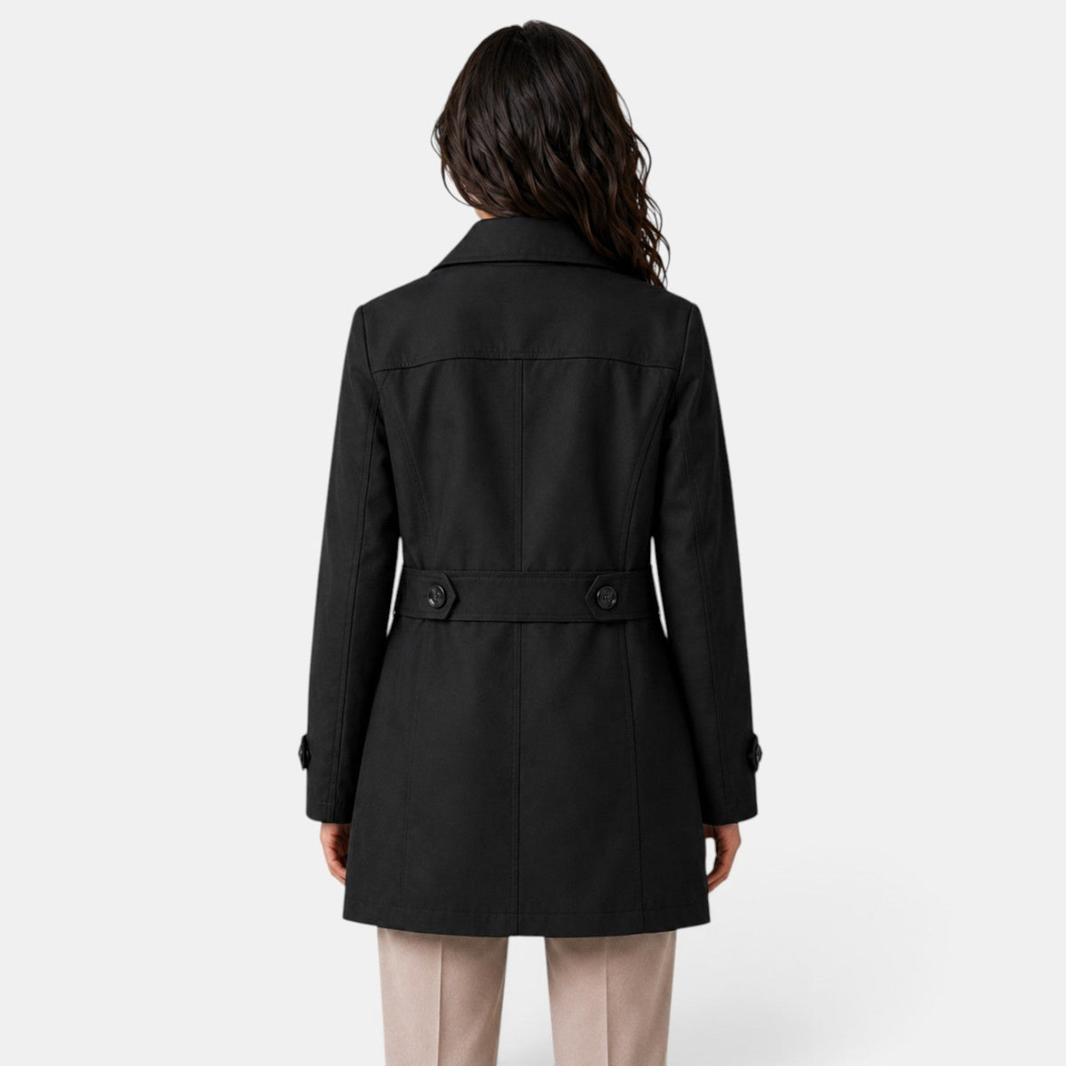 Women's long button-front trench coat with notched lapels and flap pockets