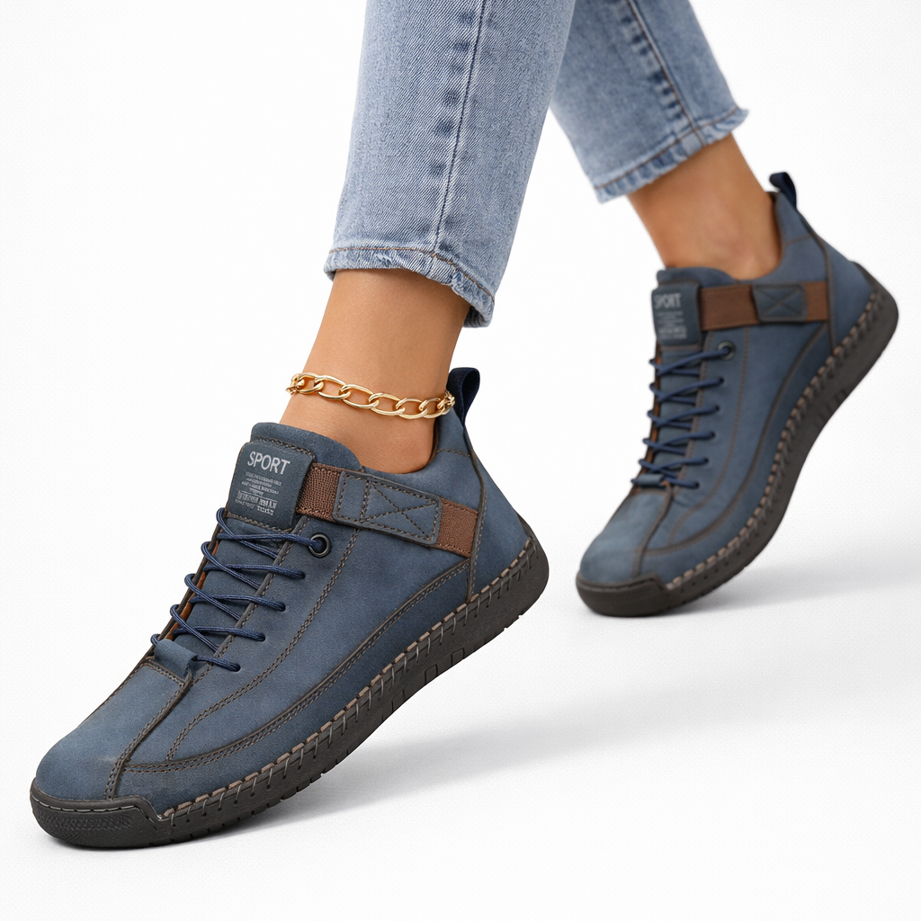 Women's lace-up ankle sneakers with rounded toes, strap detail and flat textured soles