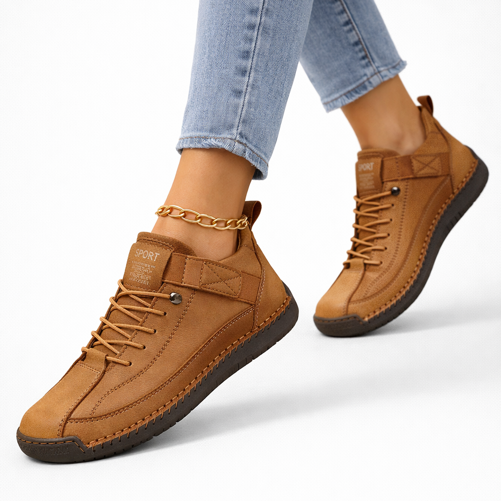 Women's lace-up ankle sneakers with rounded toes, strap detail and flat textured soles