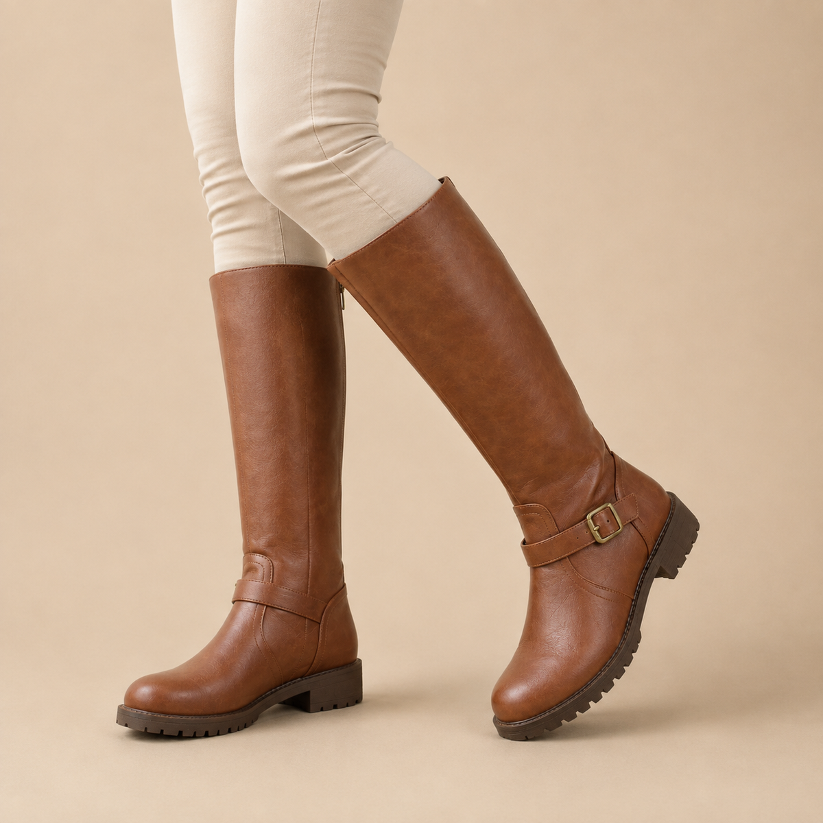 Women's tall boots with side zip, ankle buckle strap, low block heel and lugged sole