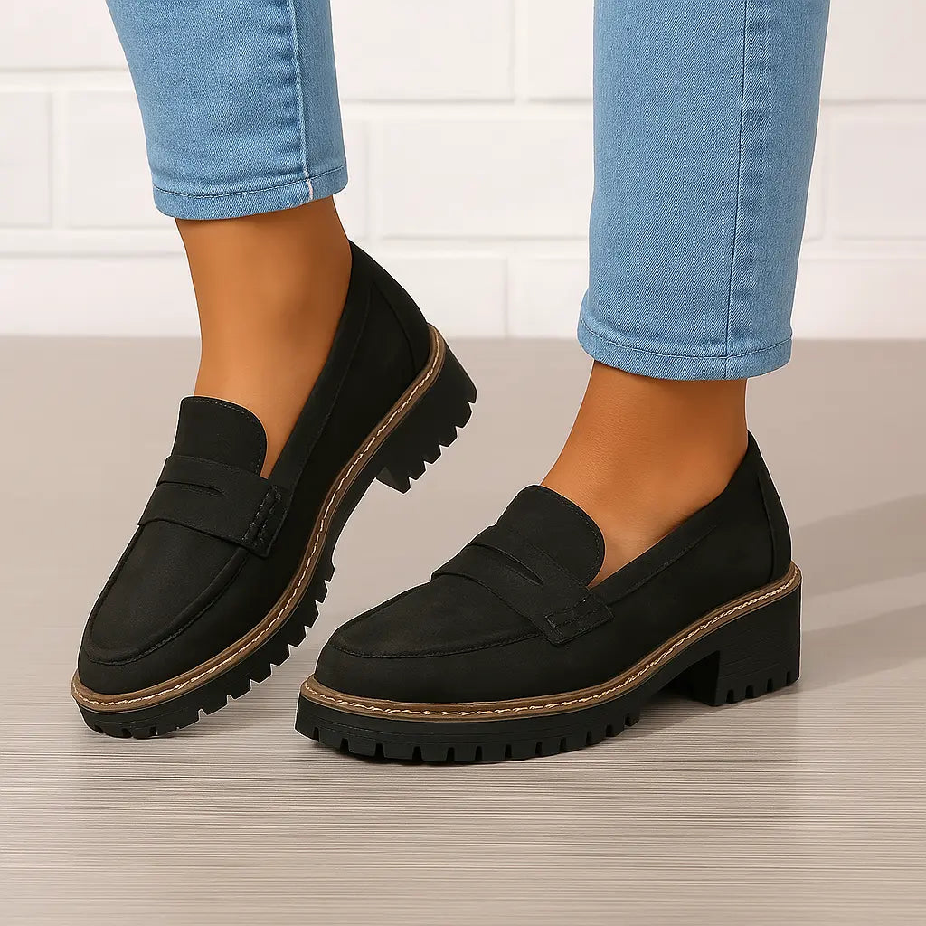 Women's platform loafers with penny straps and chunky lug soles