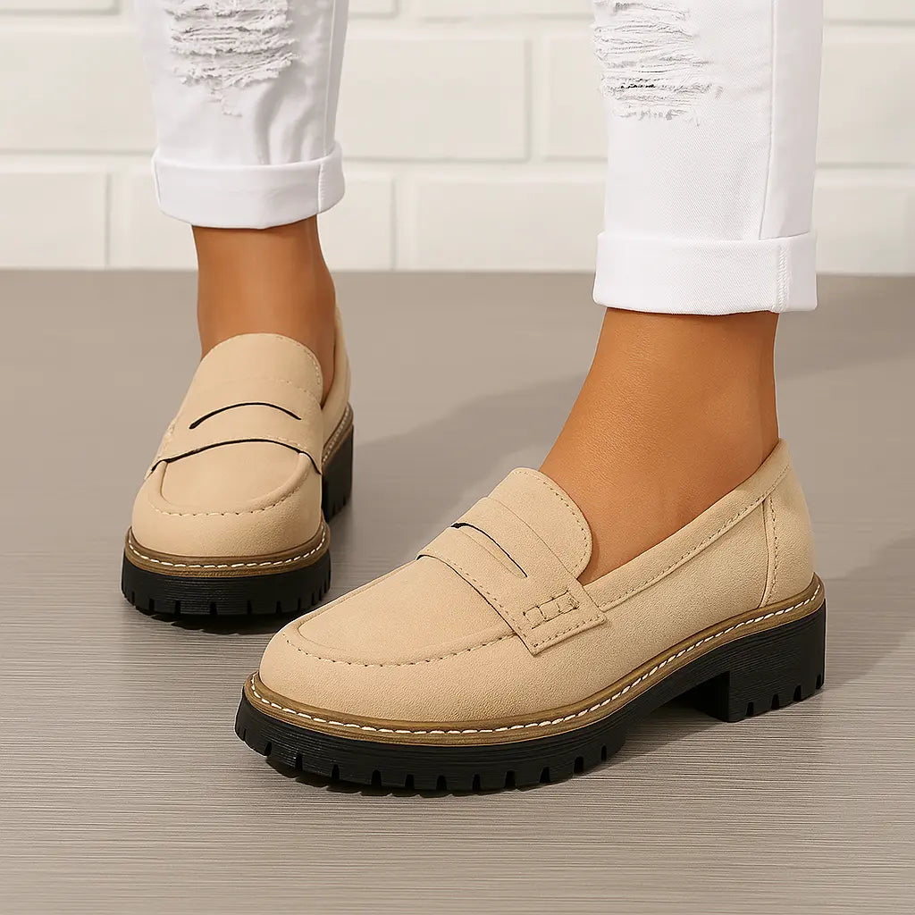 Women's platform loafers with penny straps and chunky lug soles