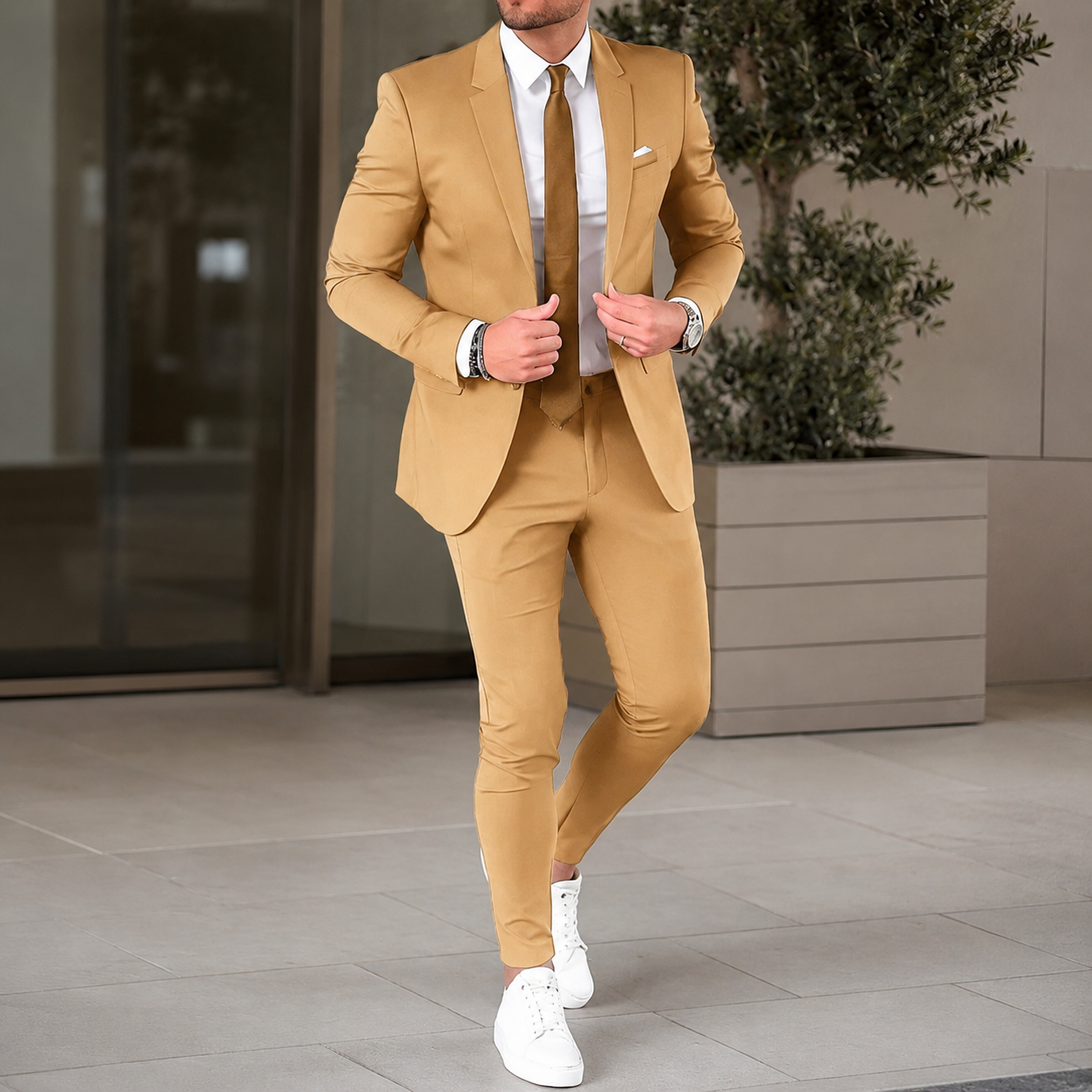 Men's two piece suit with notched lapels, matching trousers and button fastening