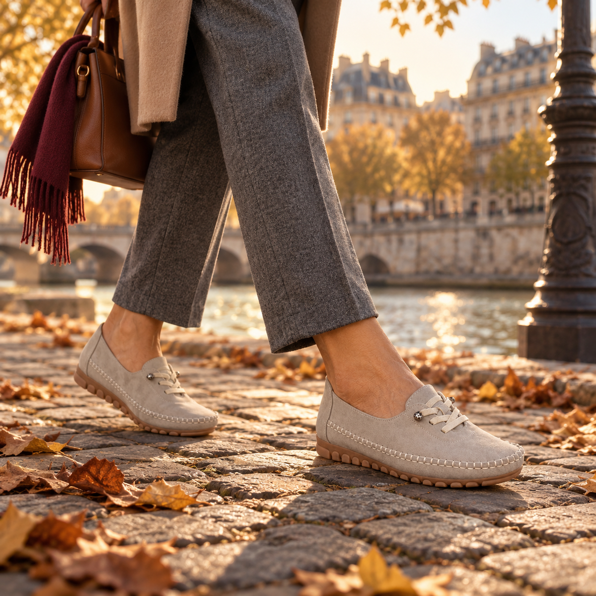 Women's moccasin loafers with lace detail, stitched trim and flat textured soles