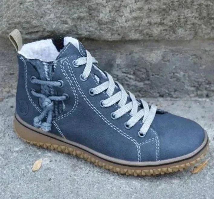 High-top lace-up boots with round toes, contrast stitching and flat textured soles