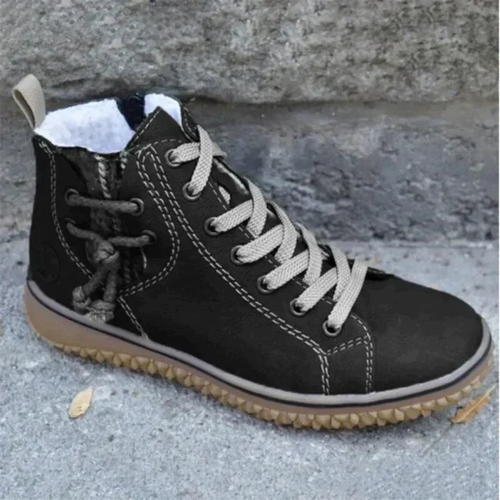 High-top lace-up boots with round toes, contrast stitching and flat textured soles