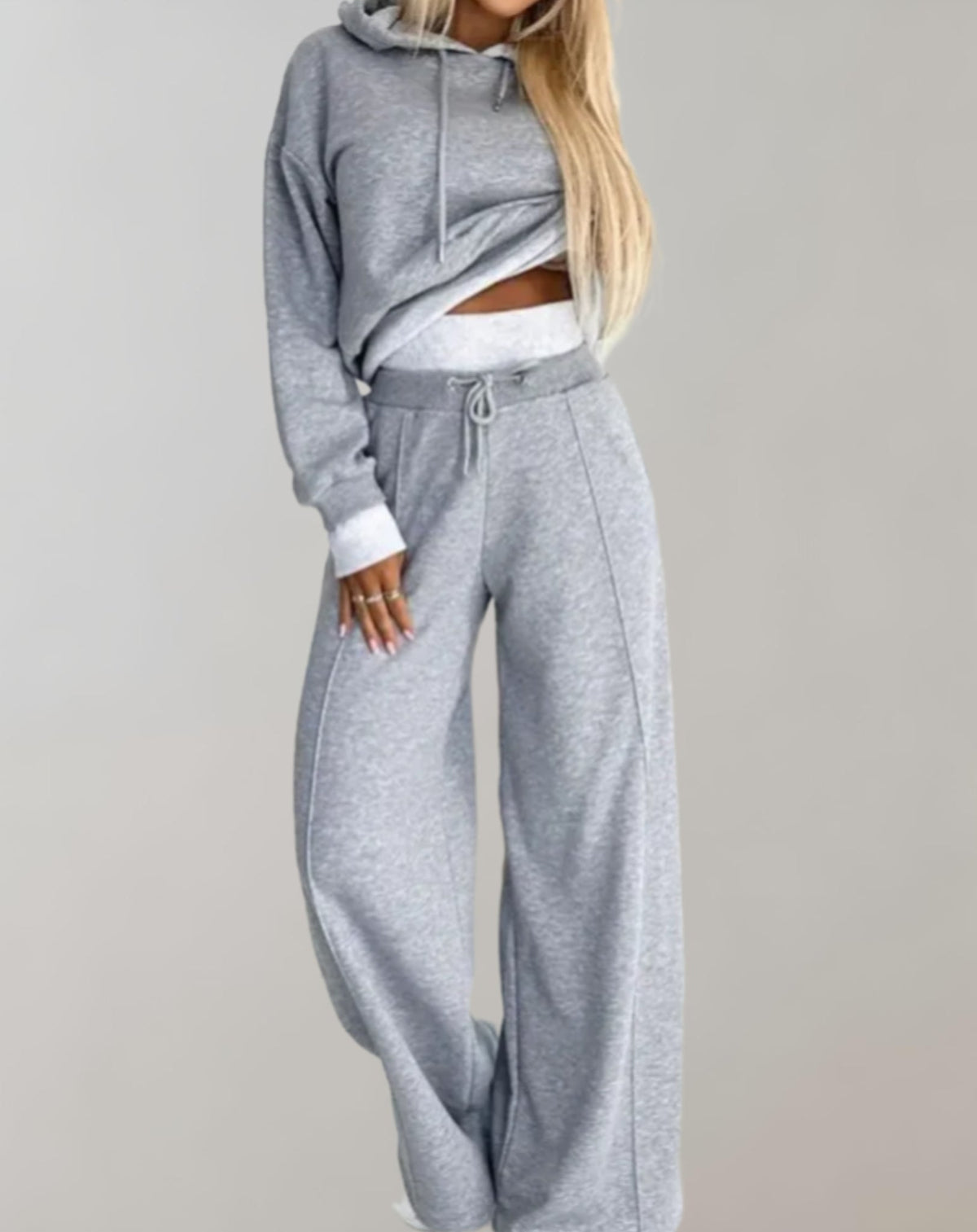Women's hooded jogging suit set with cropped top and wide-leg trousers
