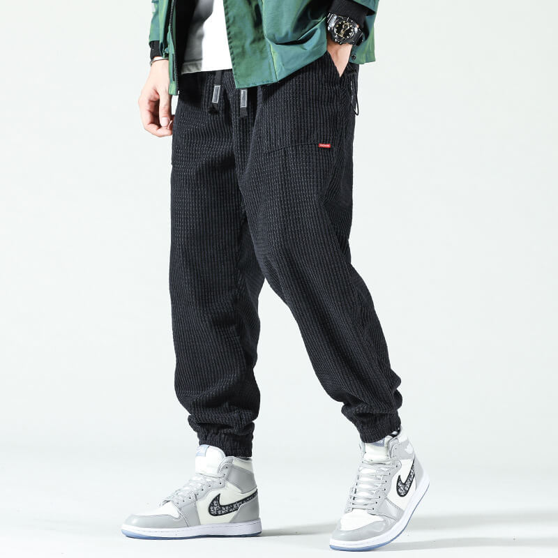 Men's textured corduroy jogger trousers with drawstring waist and elasticated cuffs