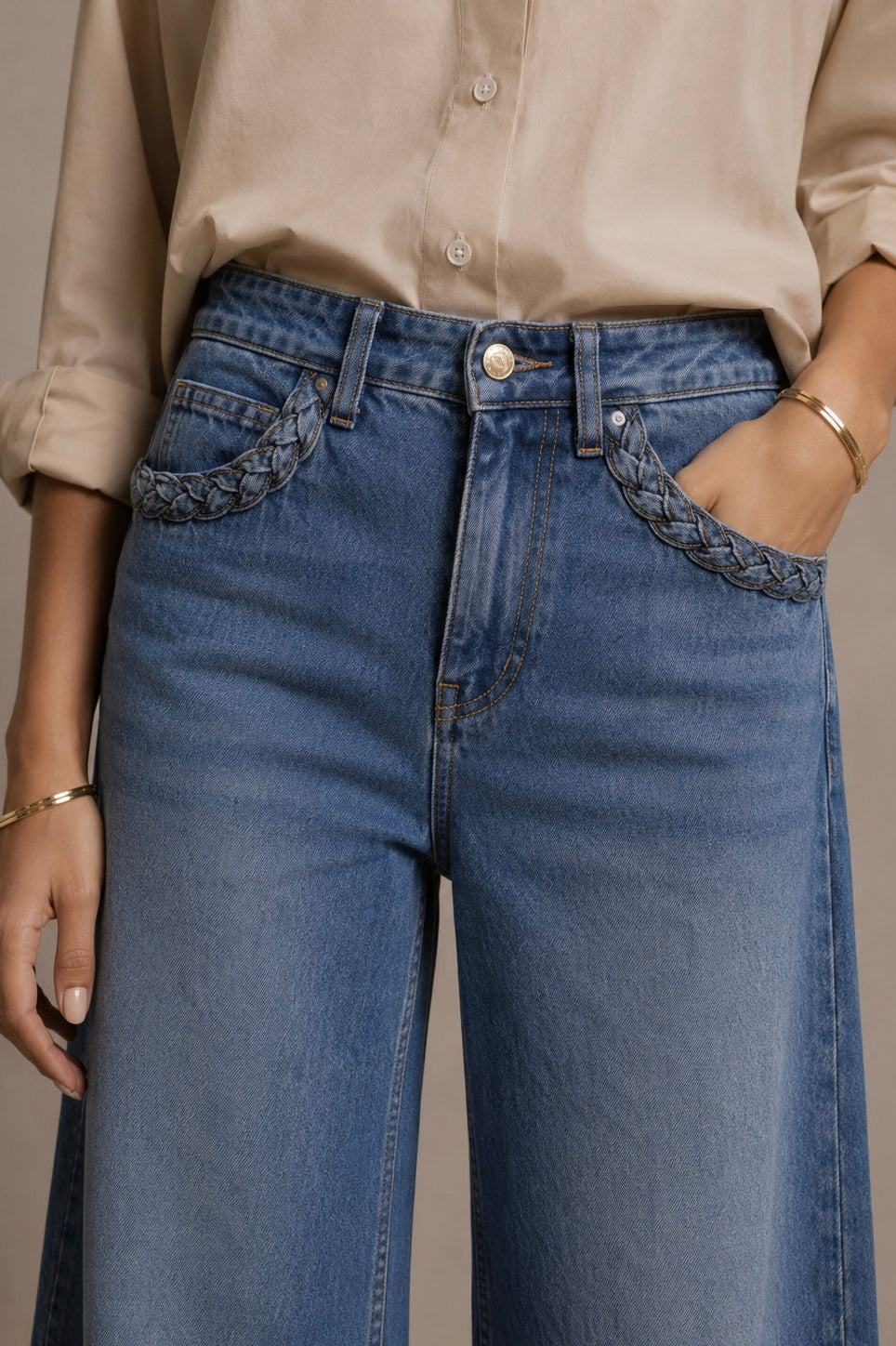 Women's blue high-rise wide-leg jeans with braided pocket trim