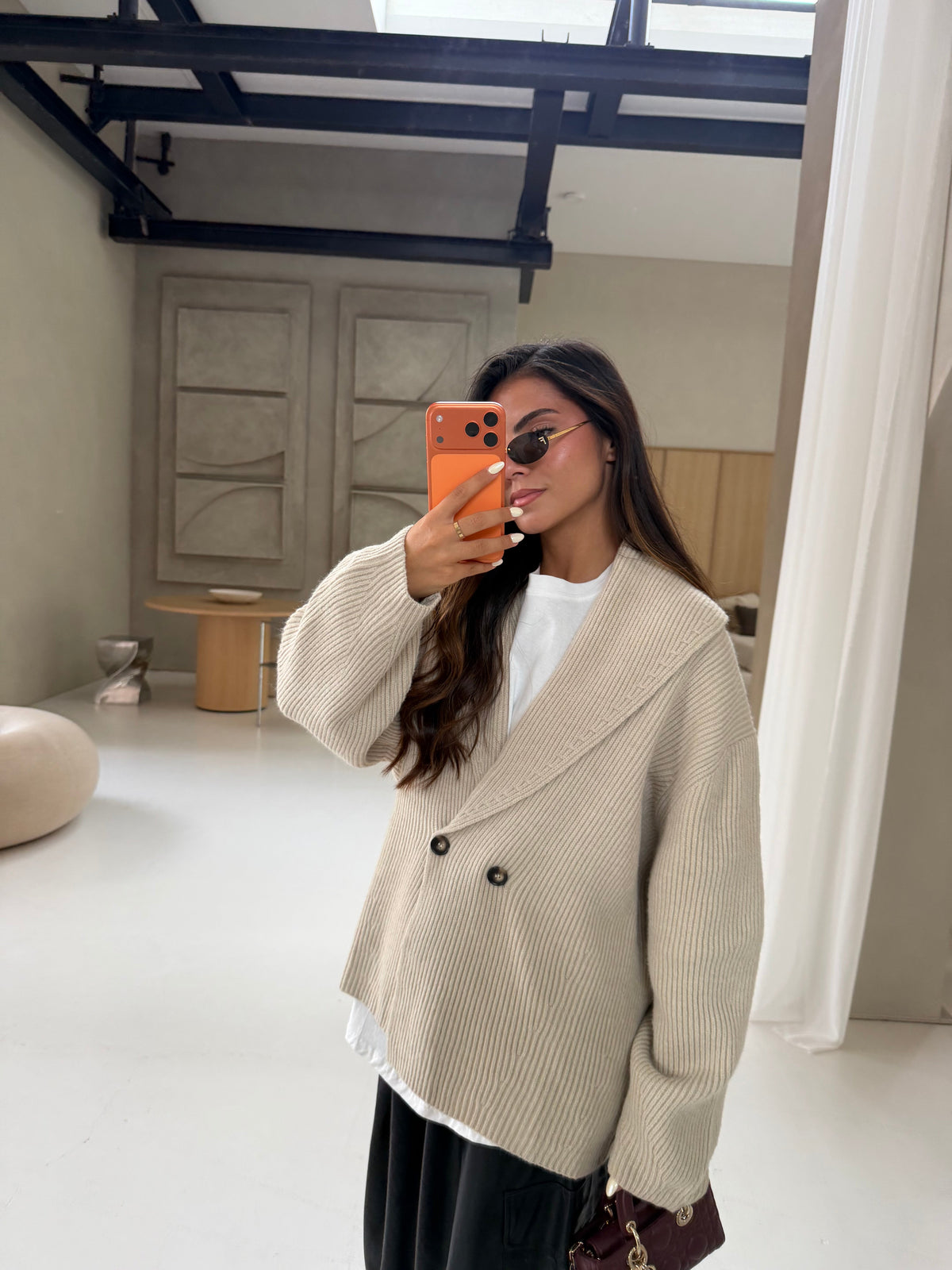 Women's beige ribbed cardigan with shawl collar and button front