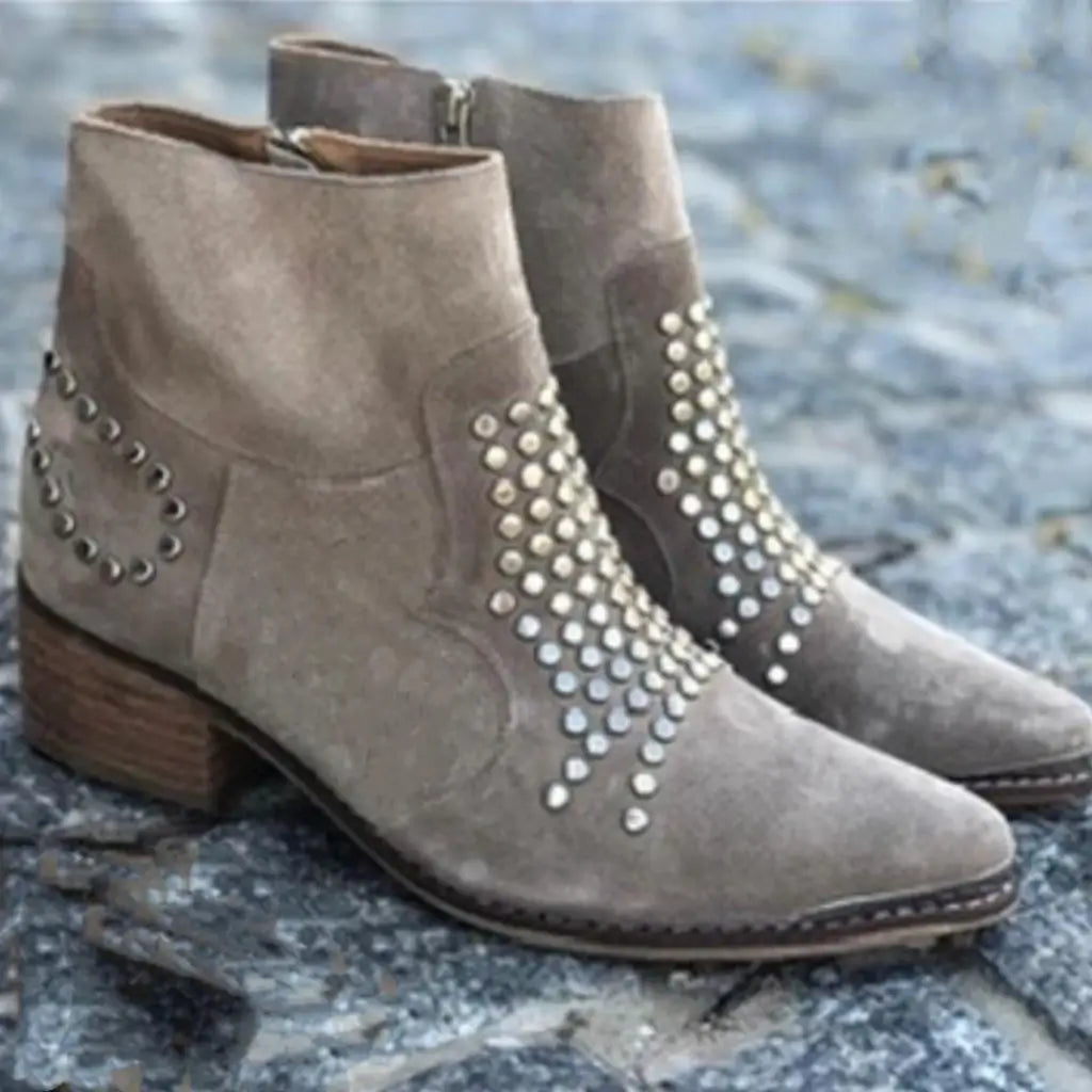 Women's beige pointed ankle boots with metallic studded panels and low block heels