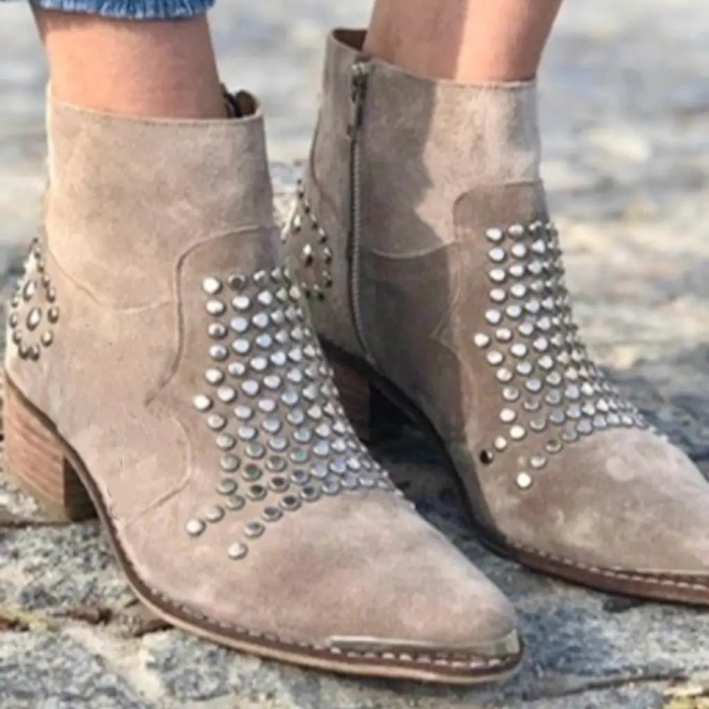 Women's beige pointed ankle boots with metallic studded panels and low block heels