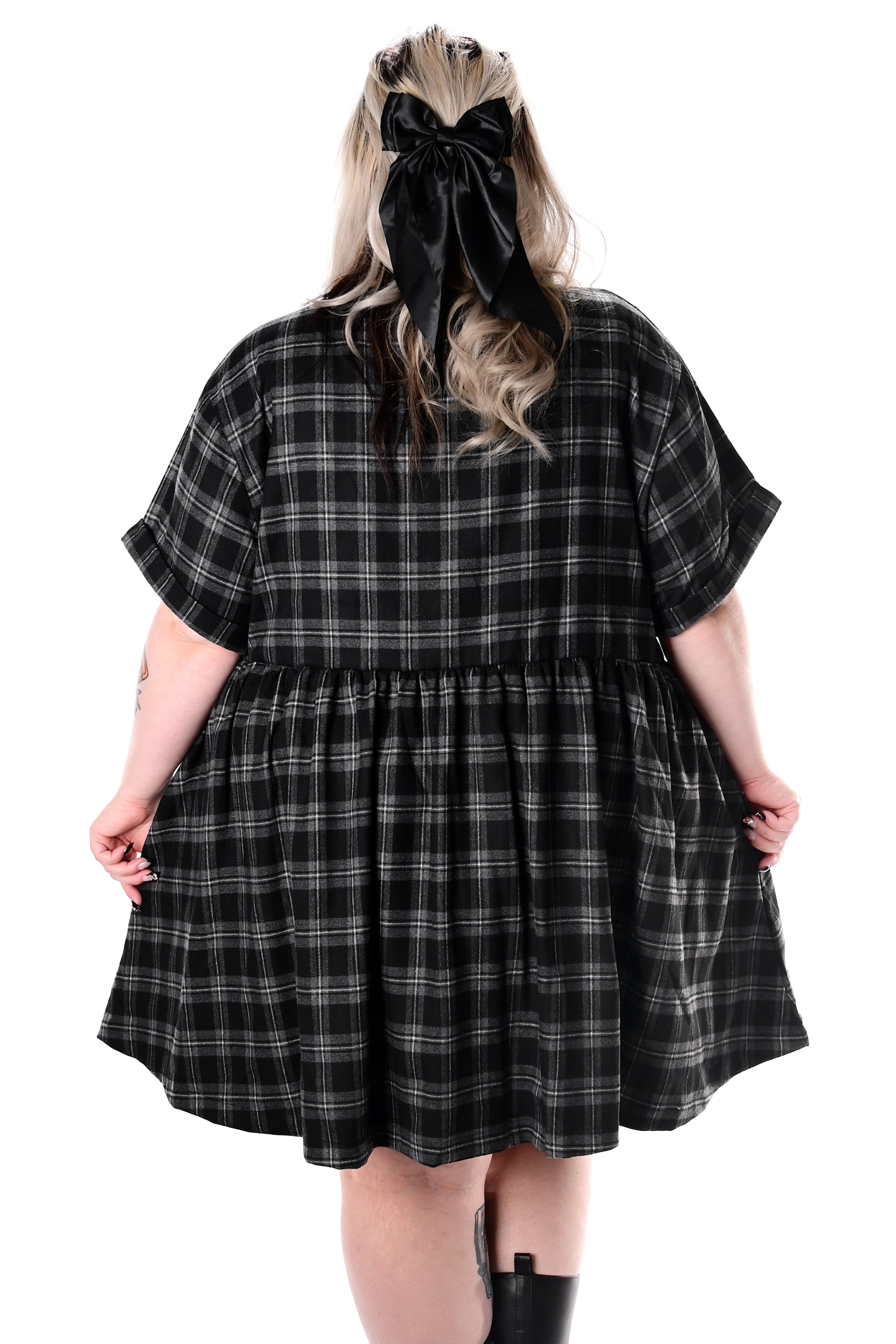 Women's black and grey checked babydoll mini dress with short sleeves and side pockets