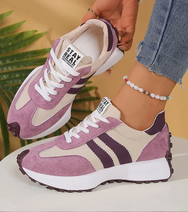 Women's striped lace-up trainers with a round toe and textured flat sole