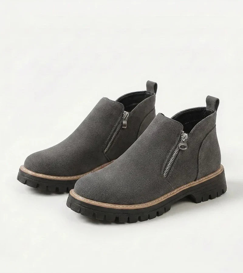 Women's ankle boots with side zips and chunky lug soles