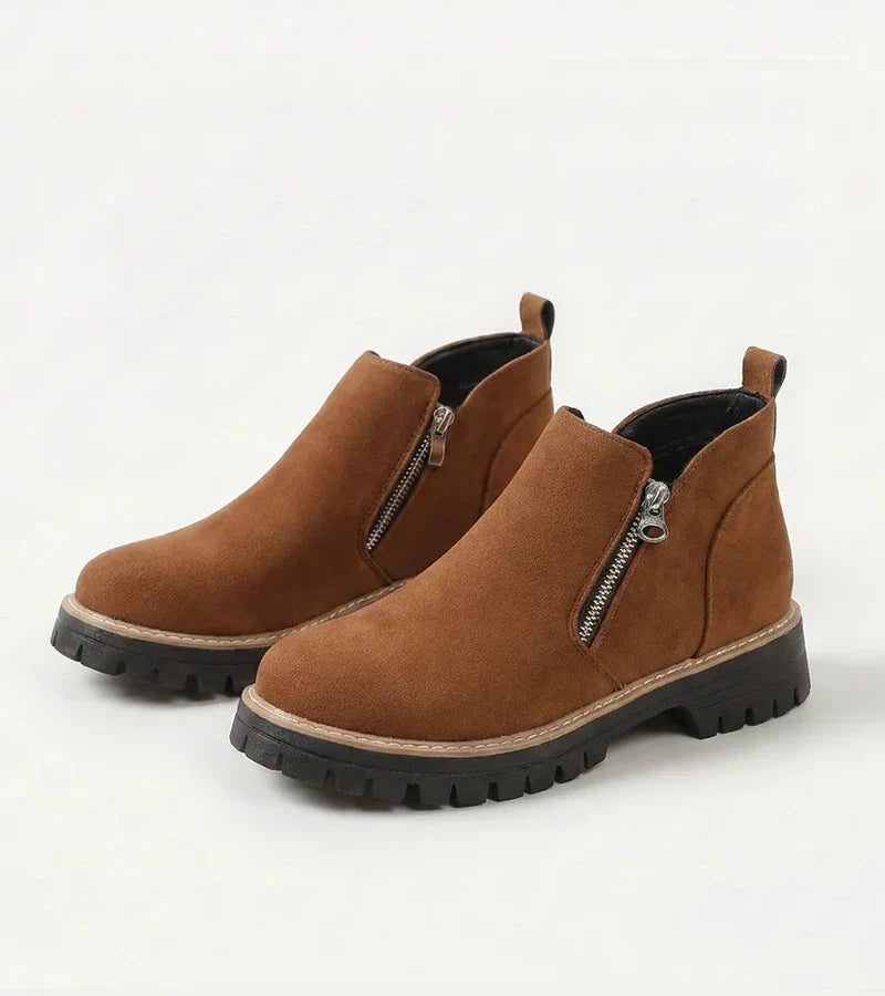 Women's ankle boots with side zips and chunky lug soles