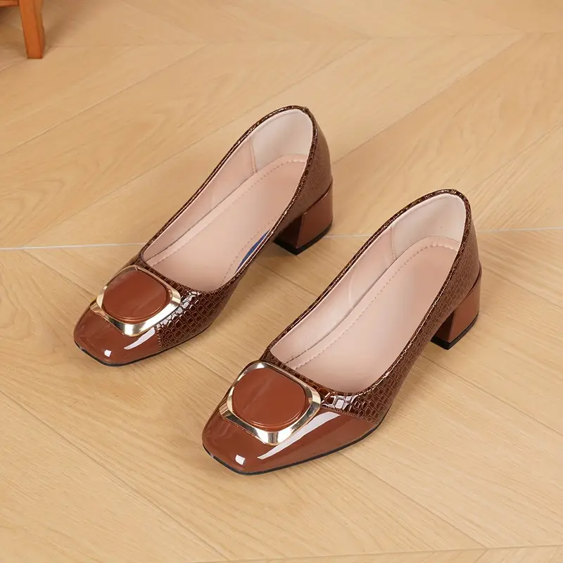 Women's textured block heel shoes with rounded toes and buckle details