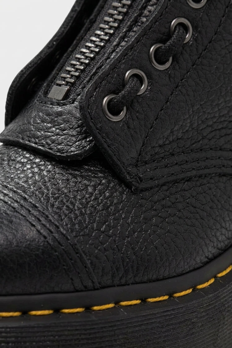 Black women's platform ankle boots with front zip, lace detail and lug soles