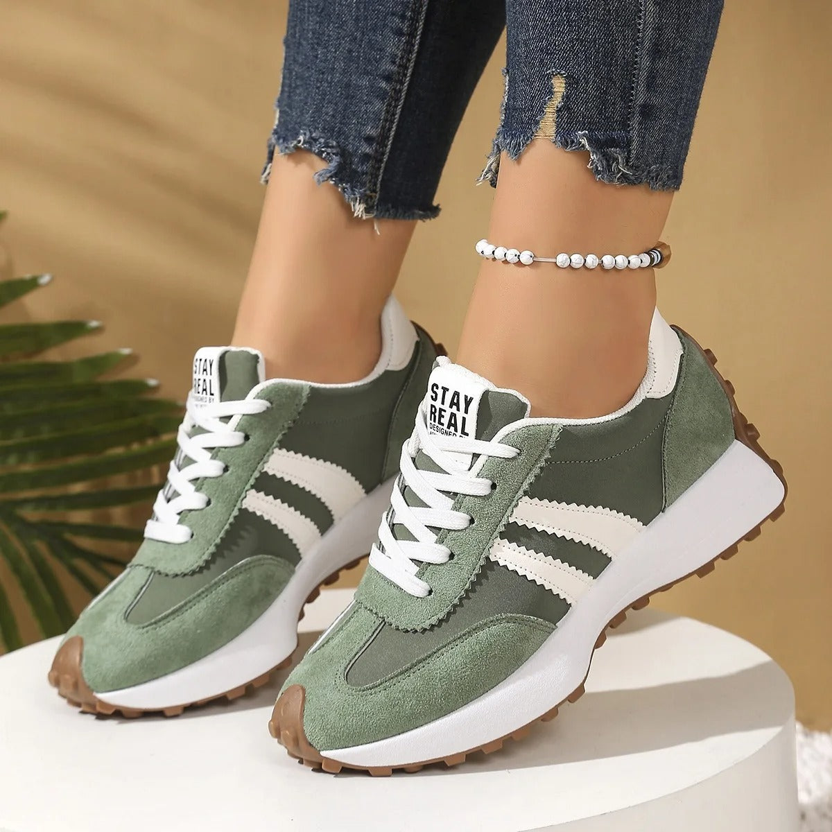 Women's retro striped platform trainers with lace-up front and chunky raised sole
