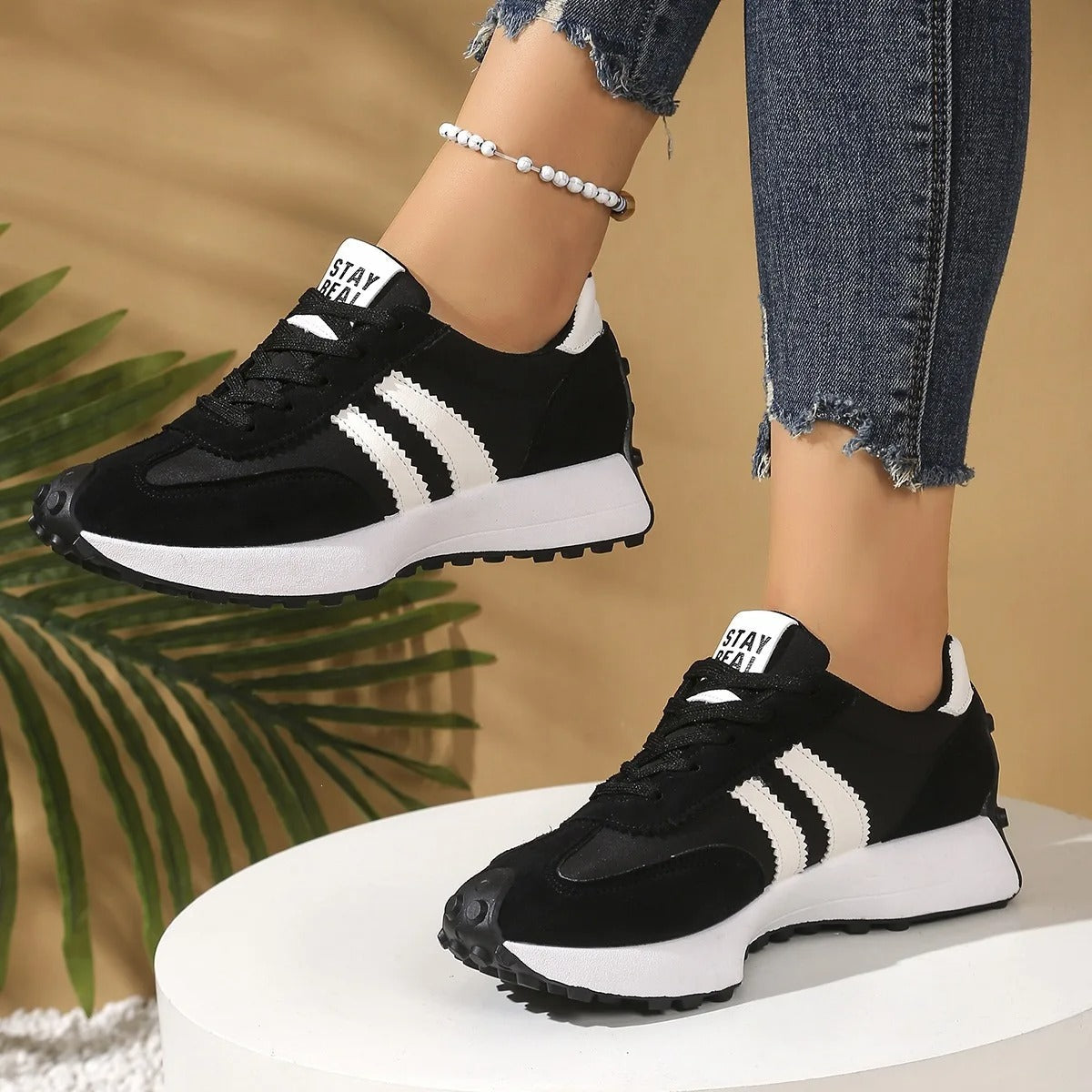 Women's retro striped platform trainers with lace-up front and chunky raised sole