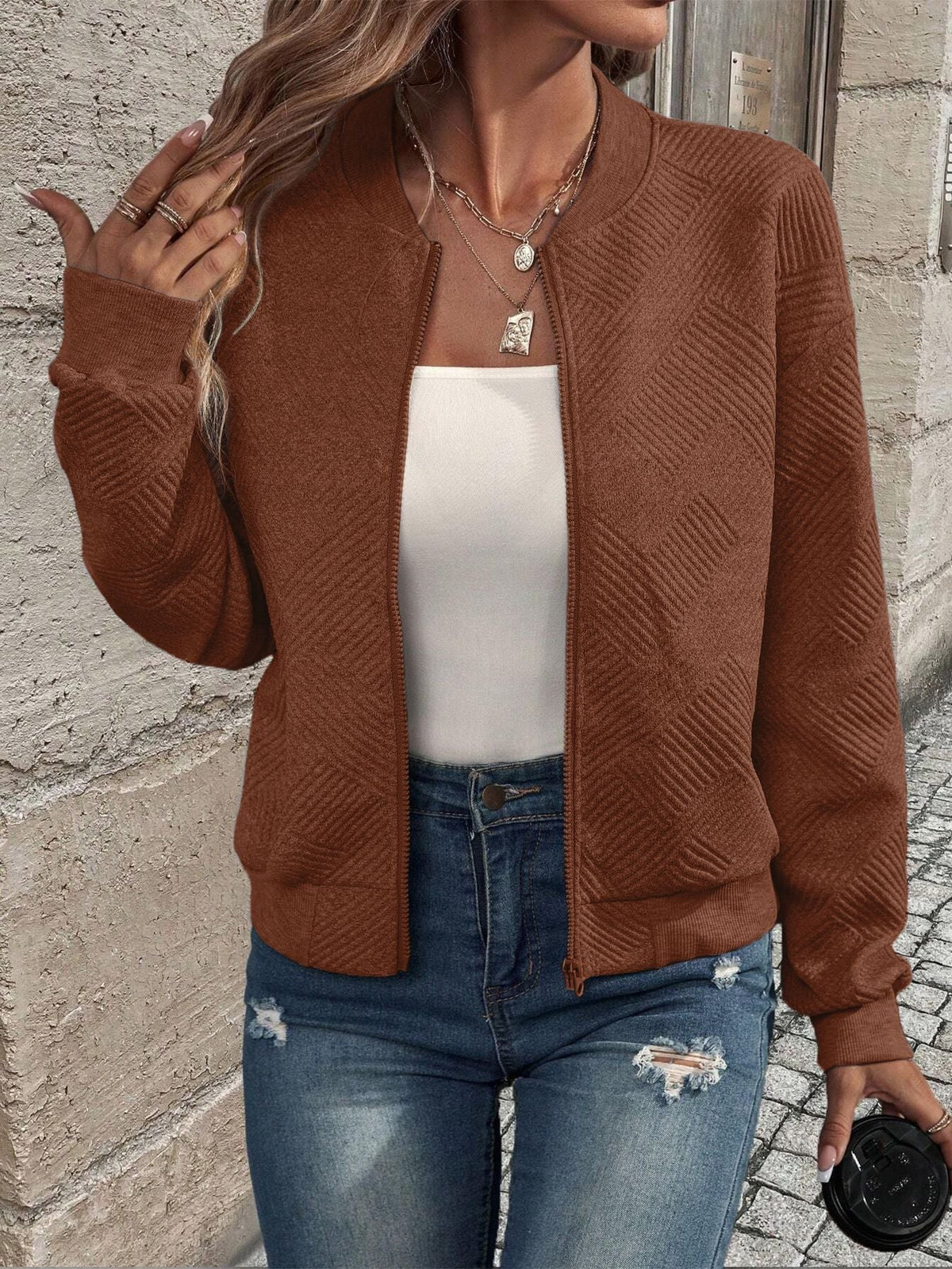 Women's textured zip jacket with mock collar and long sleeves