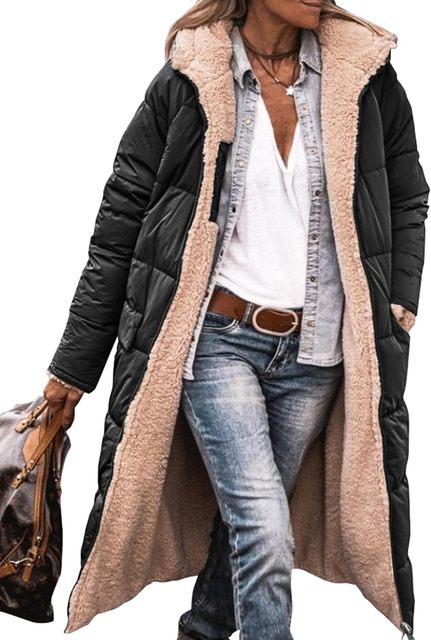 Woman wearing a long hooded quilted puffer coat with contrasting textured trim