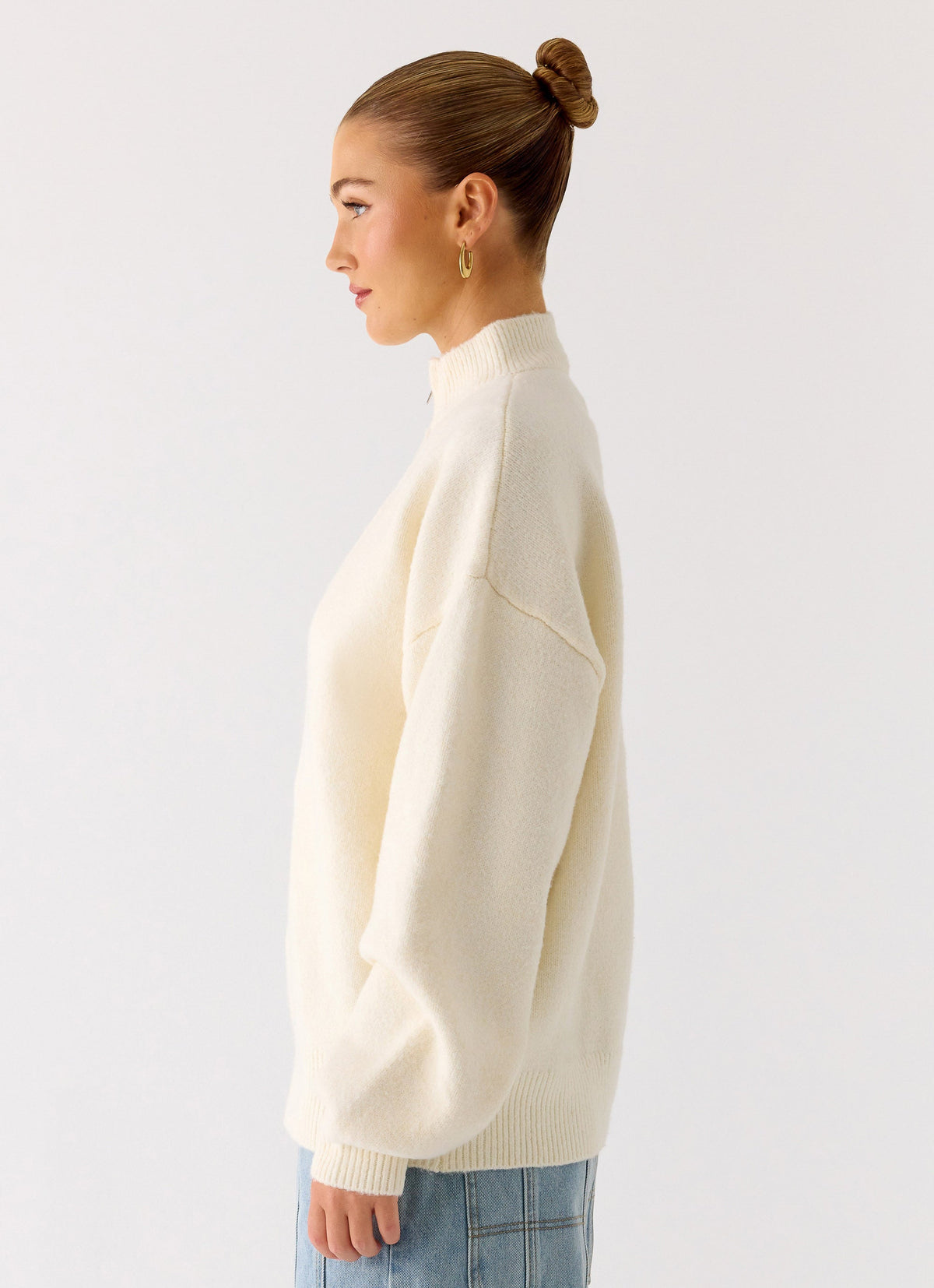 Women's ivory knitted zip jacket with high neck and long sleeves