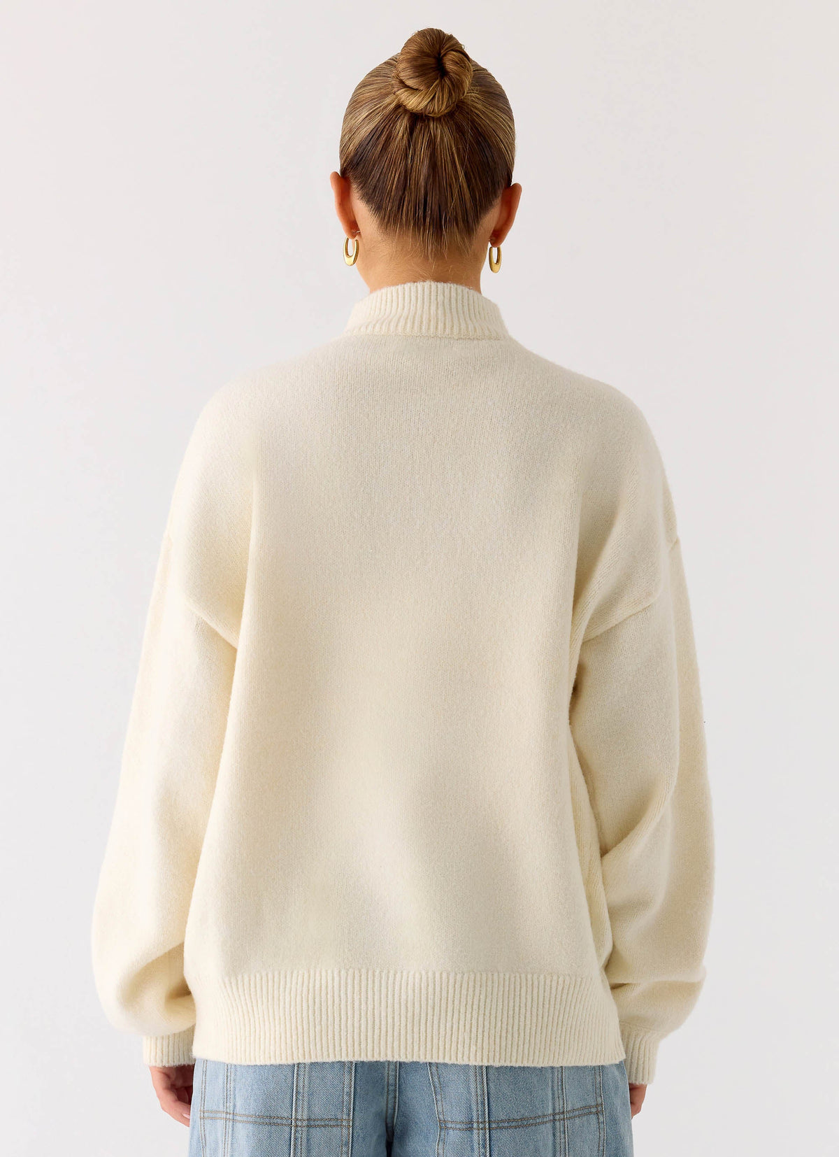 Women's ivory knitted zip jacket with high neck and long sleeves