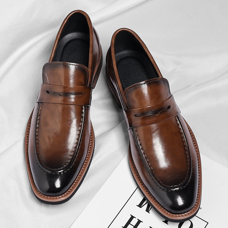 Men's penny loafers with apron toe and low heel