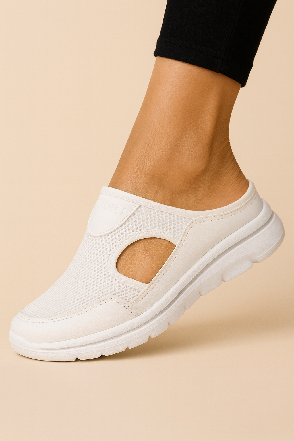 Women's slip-on athletic shoe with mesh panels and layered sole