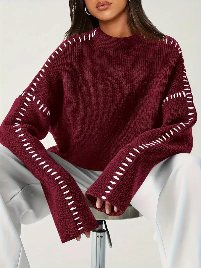 Women's ribbed knit sweater with contrasting stitch trim and long sleeves