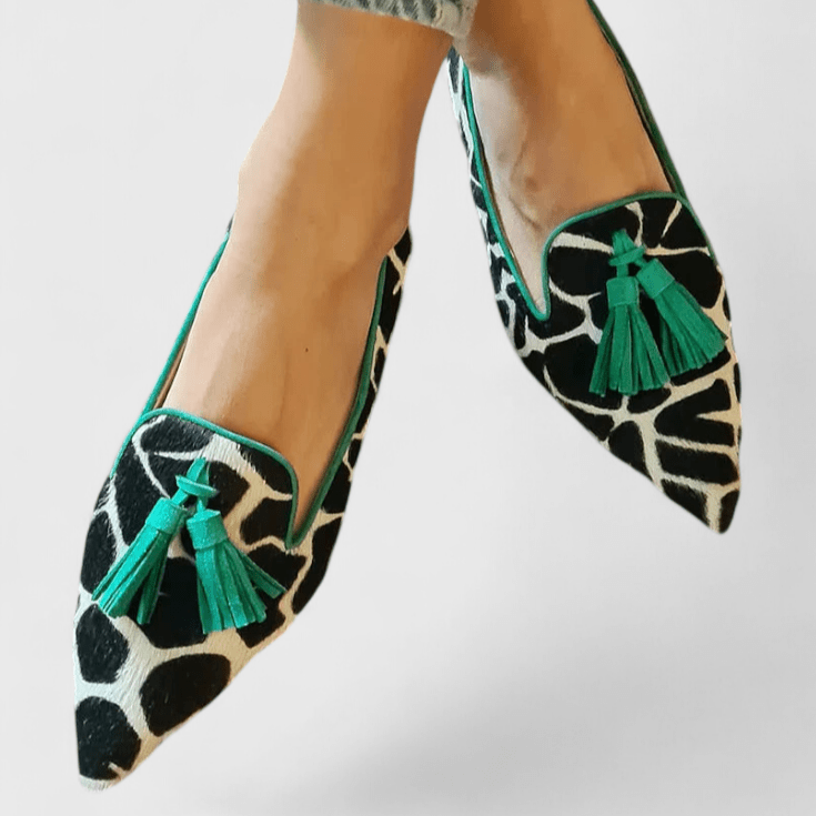 Women's pointed animal print loafers with tassel detailing