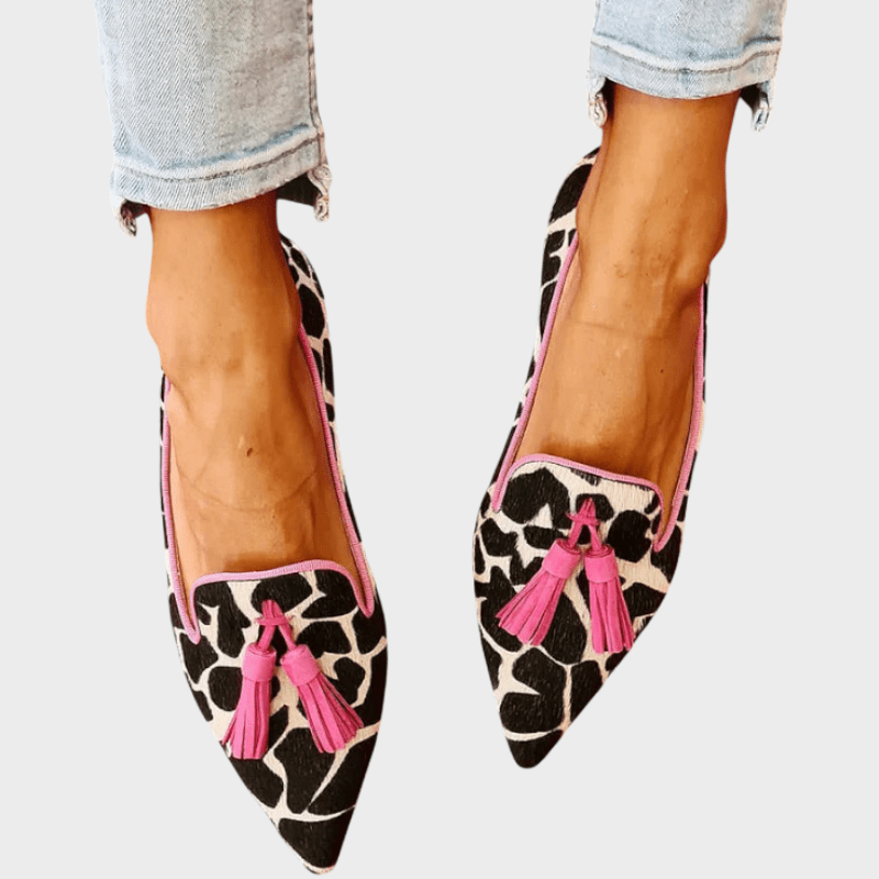 Women's pointed animal print loafers with tassel detailing