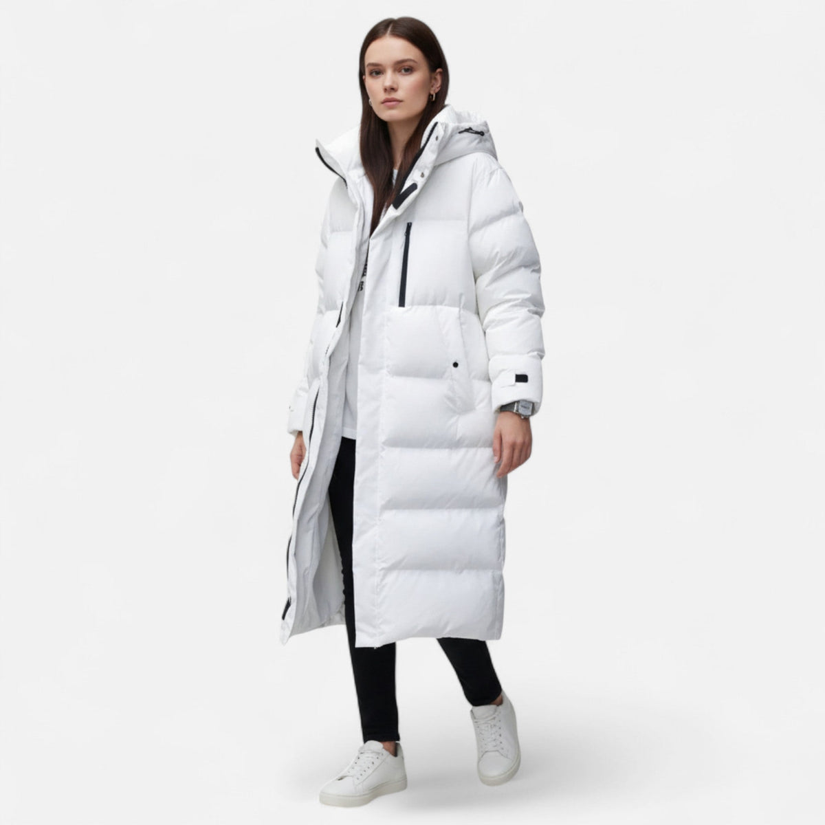 Women's long quilted hooded puffer coat shown in white and black