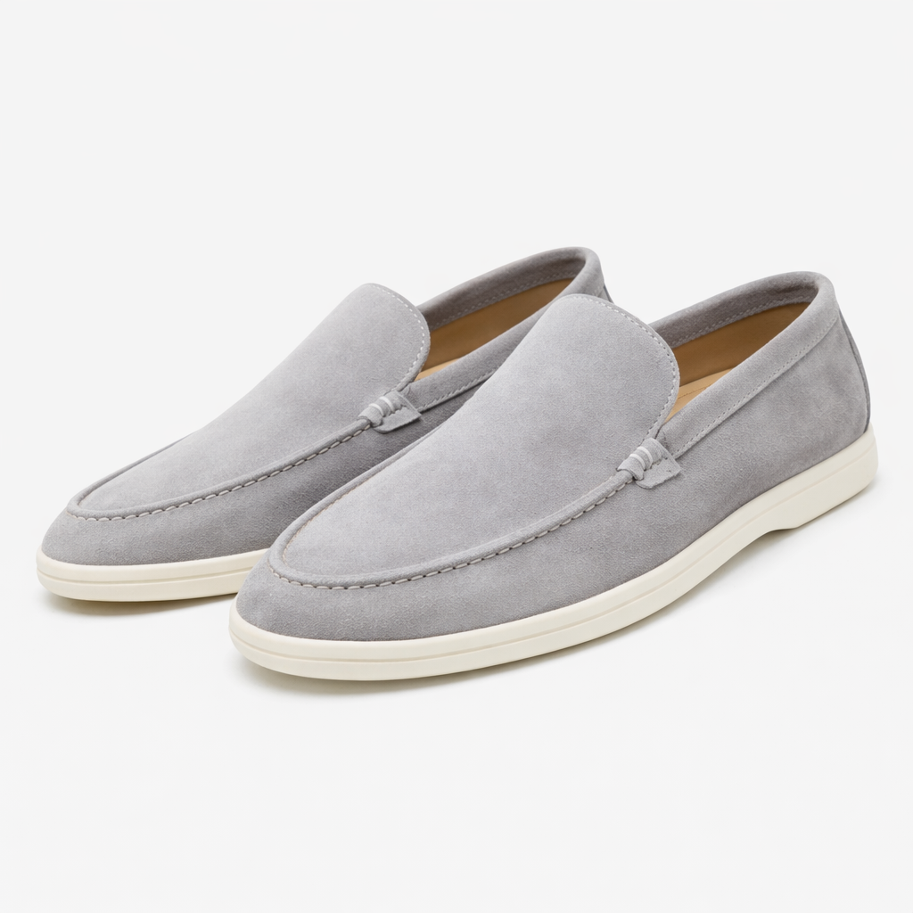 Men's moc toe slip-on loafers with stitched apron detail and low flat soles