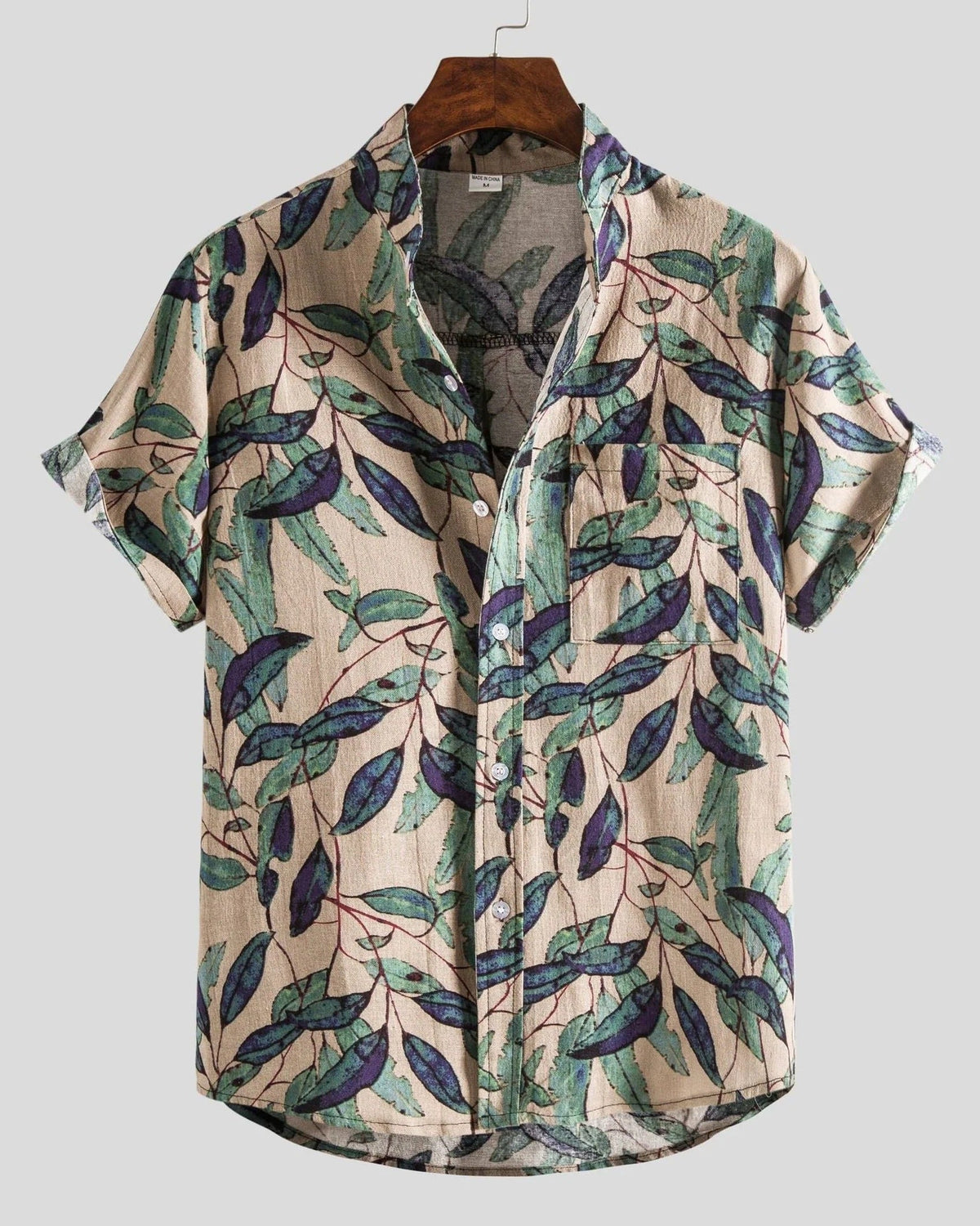 Men's short sleeve button shirt with geometric and leaf patterns
