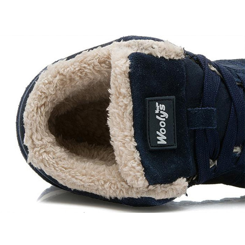 High-top sneaker boots with lace-up fronts, faux-fur collars and contrast soles
