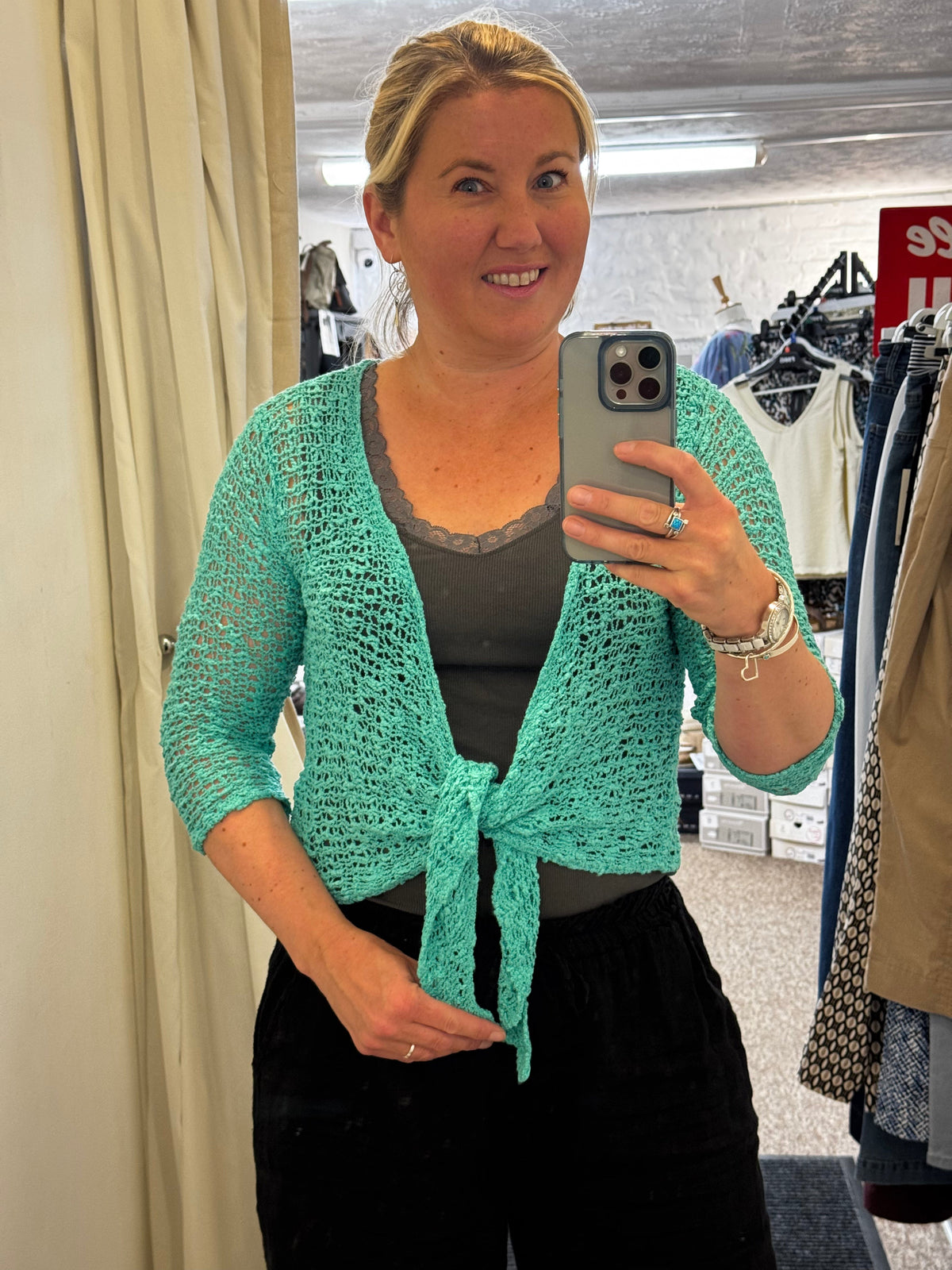 Women's open knit tie front cardigan with three quarter sleeves