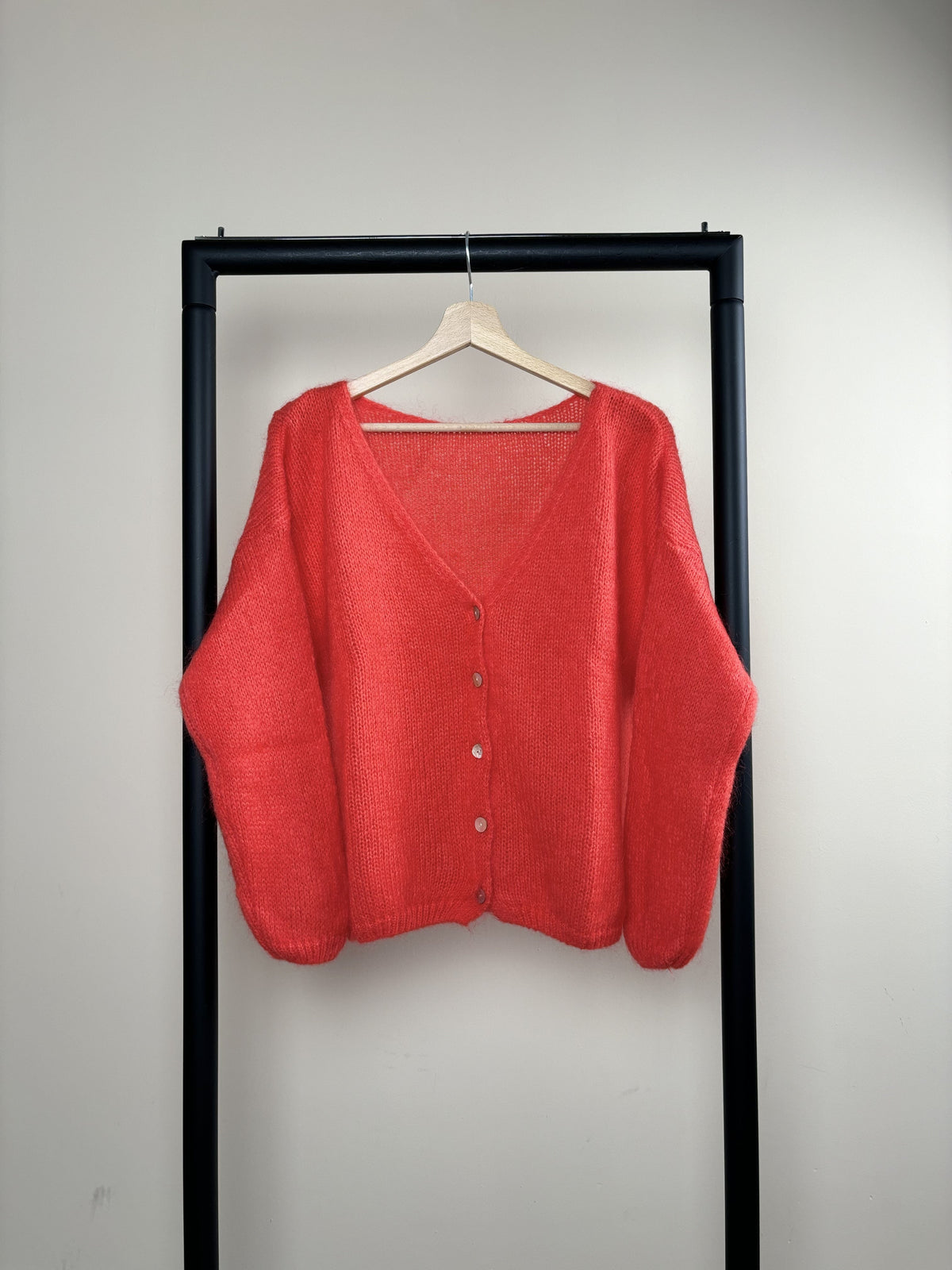 Women's V-neck knitted cardigan with long sleeves and button front